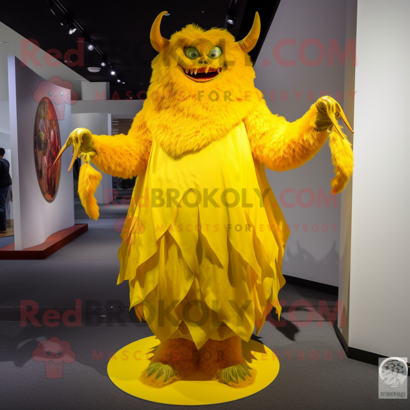 Yellow Demon mascot costume character dressed with a Evening Gown and Shawl pins Yellow Demon mascot costume character dressed with a Evening Gown and Shawl pins