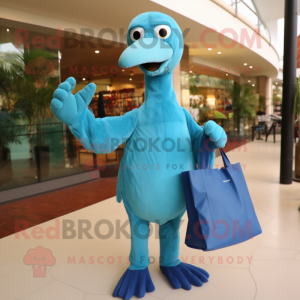 Cyan Dodo Bird mascot costume character dressed with a Jumpsuit and Tote bags