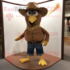 Brown Dove mascot costume character dressed with a Bootcut Jeans and Brooches