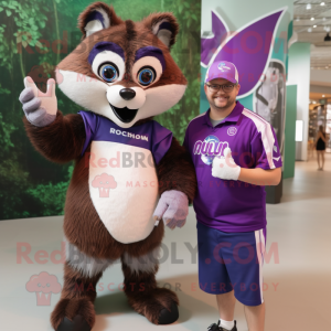 Purple Raccoon mascot costume character dressed with a Polo Shirt and Smartwatches