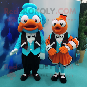 Turquoise Clown Fish mascot costume character dressed with a Tuxedo and Brooches