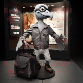 Gray Archeopteryx mascot costume character dressed with a Moto Jacket and Tote bags