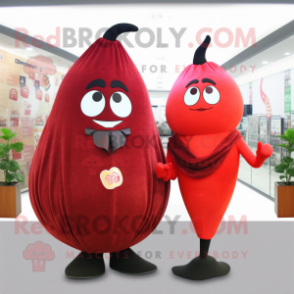 Red Pear mascot costume character dressed with a Suit and Shawls