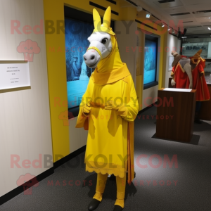 Yellow Donkey mascot costume character dressed with a Sheath Dress and Shawls