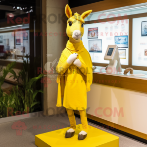 Yellow Donkey mascot costume character dressed with a Sheath Dress and Shawls