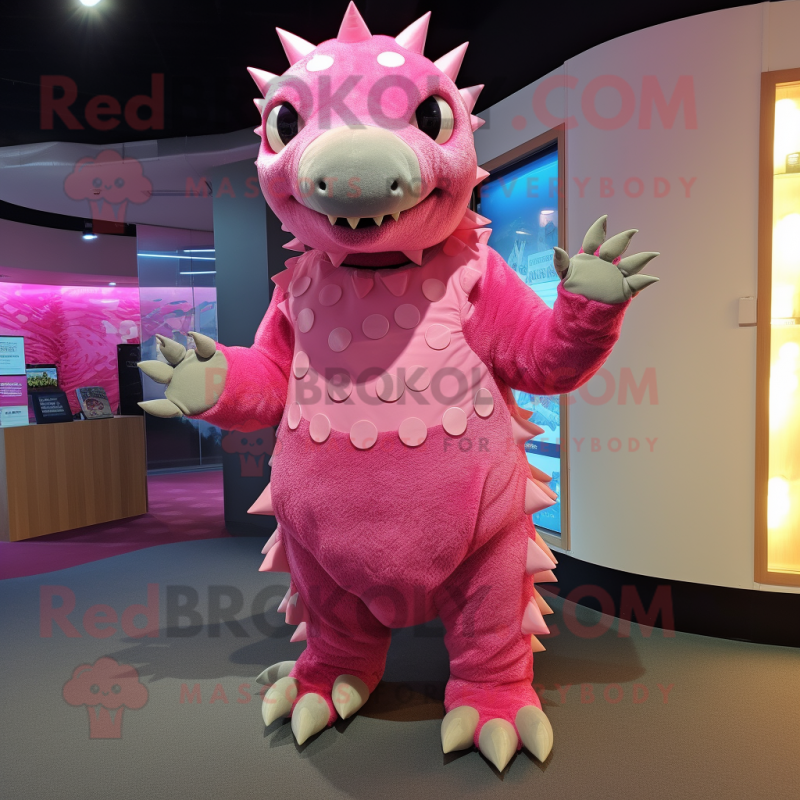 Pink Ankylosaurus mascot costume character dressed with a Cover-up and Foot pads