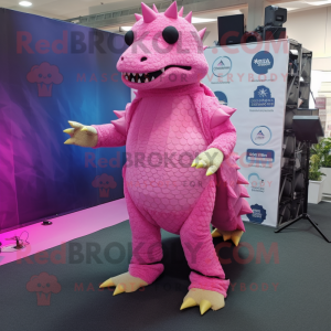 Pink Ankylosaurus mascot costume character dressed with a Cover-up and Foot pads