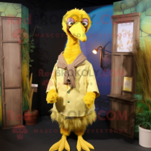 Yellow Dodo Bird mascot costume character dressed with a Waistcoat and Shawl pins