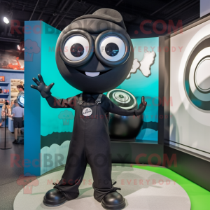 Black Plate Spinner mascot costume character dressed with a Jumpsuit and Eyeglasses