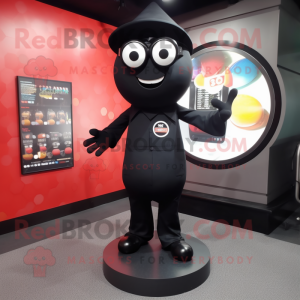 Black Plate Spinner mascot costume character dressed with a Jumpsuit and Eyeglasses