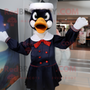 Navy Muscovy Duck mascot costume character dressed with a Dress Shirt and Mittens