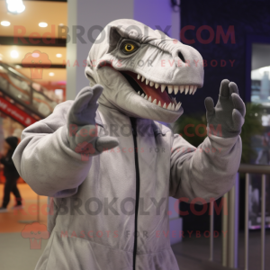 Silver Allosaurus mascot costume character dressed with a Parka and Headbands