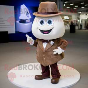 Brown Engagement Ring mascot costume character dressed with a Poplin Shirt and Messenger bags