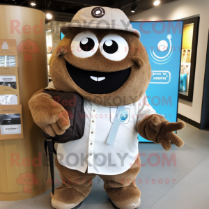 Brown Engagement Ring mascot costume character dressed with a Poplin Shirt and Messenger bags
