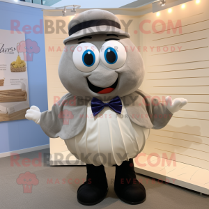 Gray Oyster mascot costume character dressed with a Polo Tee and Bow ties