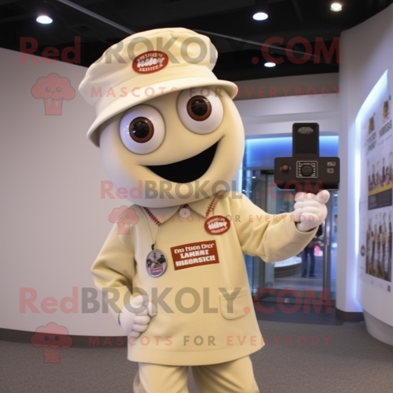 Cream Camera mascot costume character dressed with a Button-Up Shirt and Caps