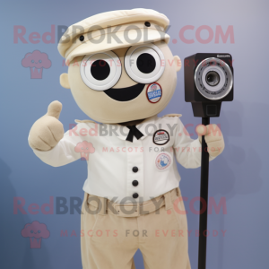 Cream Camera mascot costume character dressed with a Button-Up Shirt and Caps