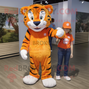 Orange Tiger mascot costume character dressed with a Mom Jeans and Caps