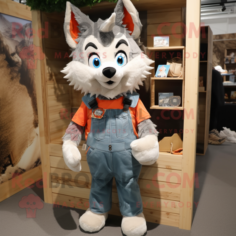 Peach Say Wolf mascot costume character dressed with a Dungarees and Keychains Peach Say Wolf mascot costume character dressed with a Dungarees and Keychains
