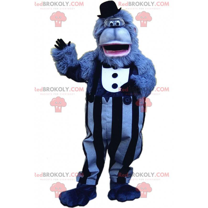 Mascotte blauwe gorilla met een elegante outfit, gigantische