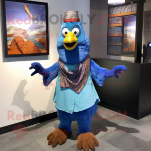 Blue Tandoori Chicken mascot costume character dressed with a Cardigan and Suspenders