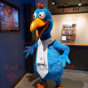 Blue Tandoori Chicken mascot costume character dressed with a Cardigan and Suspenders
