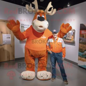 Orange Moose mascot costume character dressed with a Mom Jeans and Suspenders