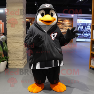 Black Penguin mascot costume character dressed with a Hoodie and Keychains