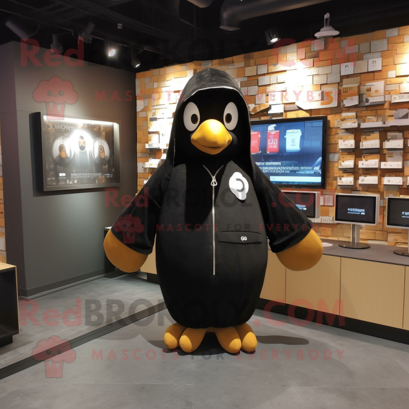 Black Penguin mascot costume character dressed with a Hoodie and Keychains