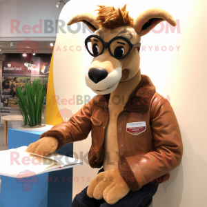 Tan Goat mascot costume character dressed with a Leather Jacket and Reading glasses