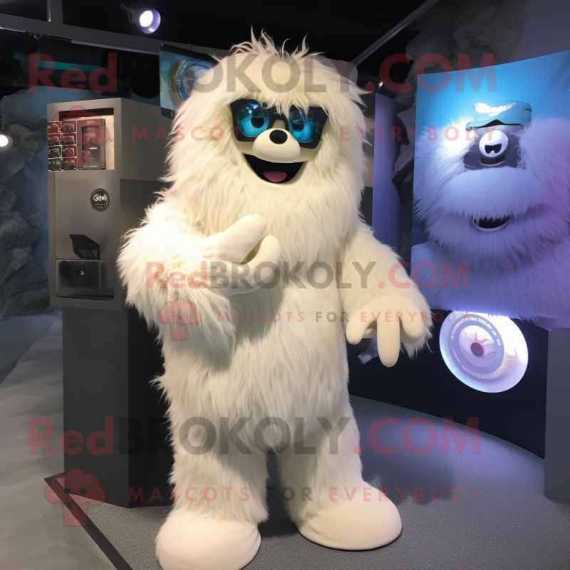 Cream Yeti mascot costume character dressed with a T-Shirt and Eyeglasses Cream Yeti mascot costume character dressed with a T-Shirt and Eyeglasses