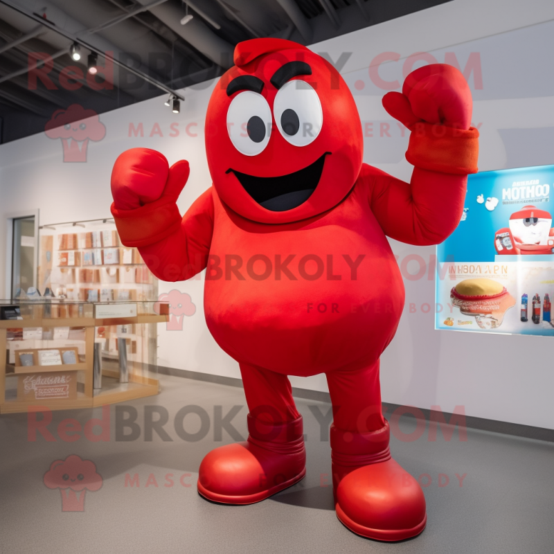 Red Boxing Glove mascot costume character dressed with a Mom Jeans and Gloves Red Boxing Glove mascot costume character dressed with a Mom Jeans and Gloves
