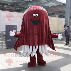 Maroon Jellyfish mascot costume character dressed with a Poplin Shirt and Foot pads