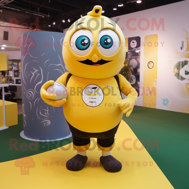 Yellow Rugby Ball mascot costume character dressed with a T-Shirt and Rings