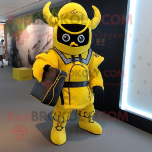 Yellow Samurai mascot costume character dressed with a Suit and Messenger bags