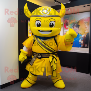 Yellow Samurai mascot costume character dressed with a Suit and Messenger bags