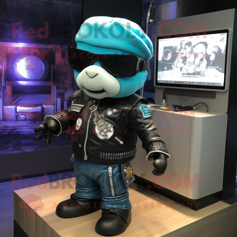 Cyan Television mascot costume character dressed with a Biker Jacket and Hat pins Cyan Television mascot costume character dressed with a Biker Jacket and Hat pins