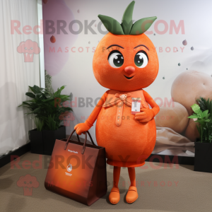 Orange Strawberry mascot costume character dressed with a Cocktail Dress and Tote bags