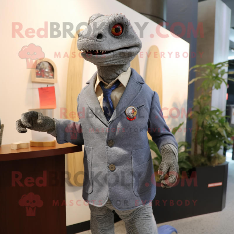 Gray Lizard mascot costume character dressed with a Sheath Dress and Lapel pins