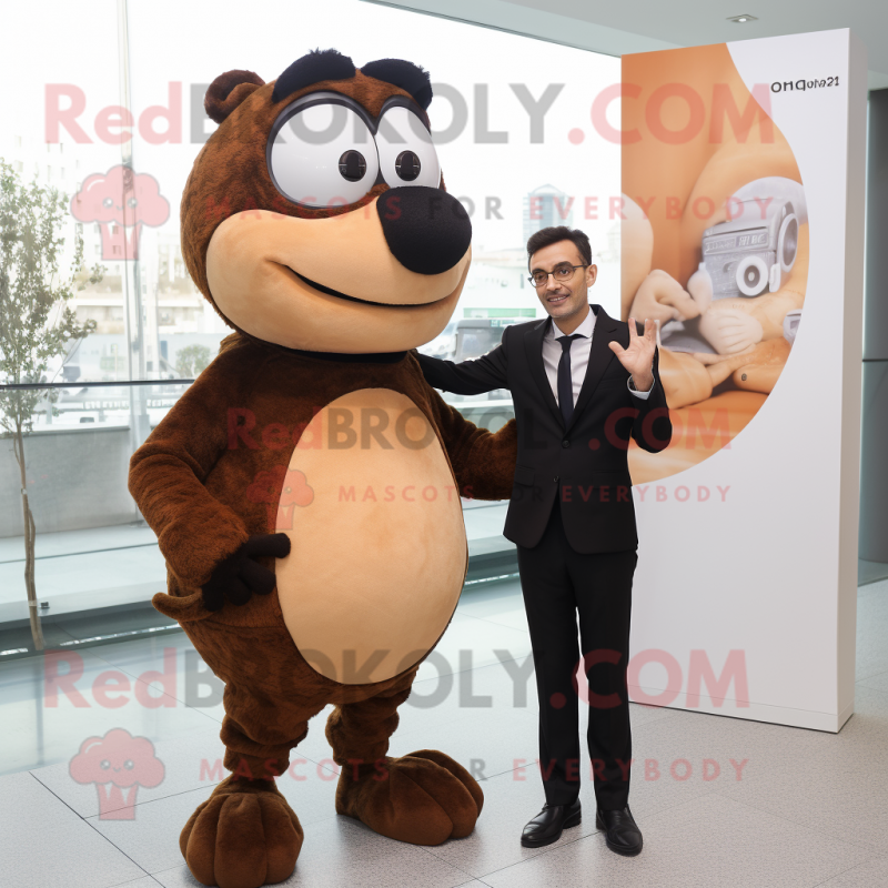 Tan Moussaka mascot costume character dressed with a Suit and Watches