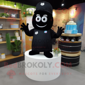 Black Wedding Cake mascot costume character dressed with a Sweatshirt and Caps