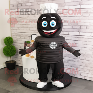 Black Wedding Cake mascot costume character dressed with a Sweatshirt and Caps