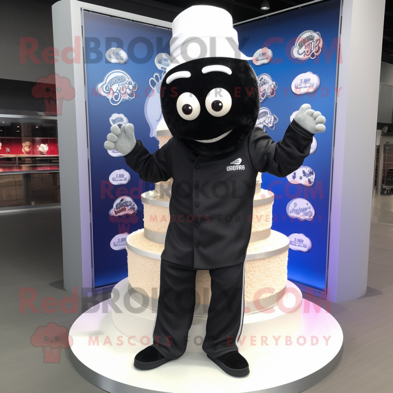 Black Wedding Cake mascot costume character dressed with a Sweatshirt and Caps Black Wedding Cake mascot costume character dressed with a Sweatshirt and Caps