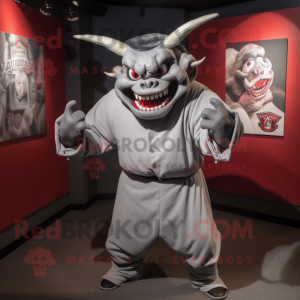 Silver Devil mascot costume character dressed with a Baseball Tee and Wraps
