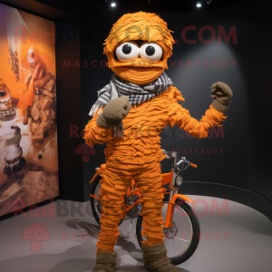 Orange Mummy mascot costume character dressed with a Biker Jacket and Scarf clips