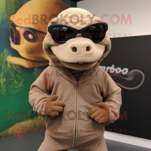 Tan Komodo Dragon mascot costume character dressed with a Sweatshirt and Eyeglasses