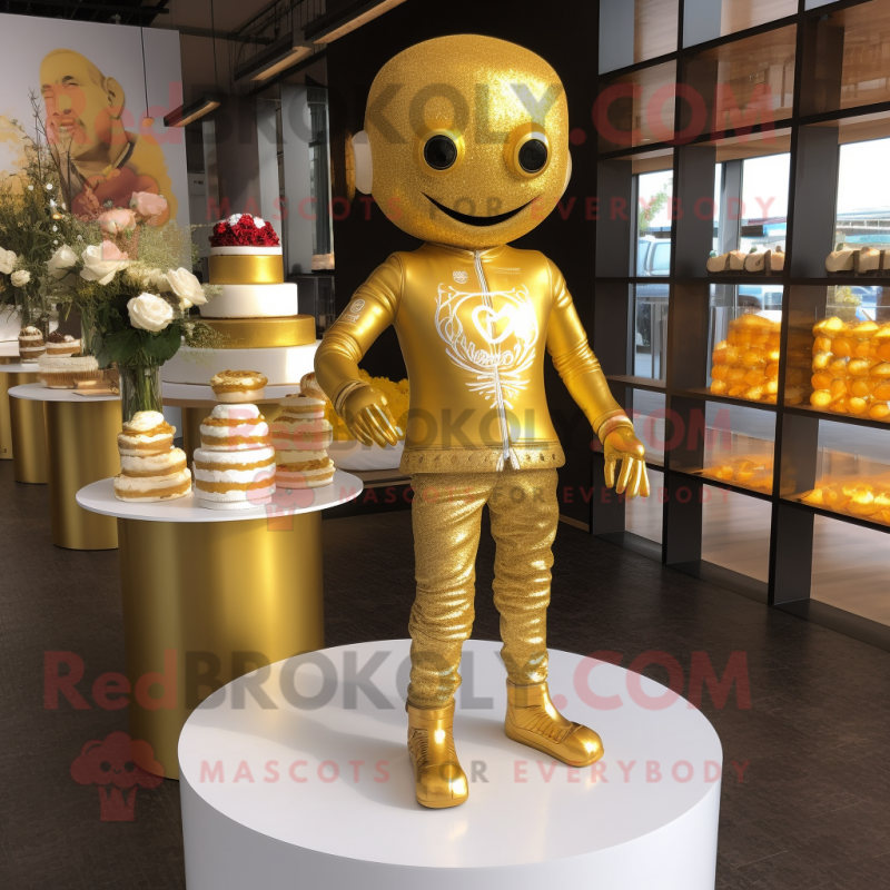 Gold Wedding Cake mascot costume character dressed with a Yoga Pants and Lapel pins Gold Wedding Cake mascot costume character dressed with a Yoga Pants and Lapel pins