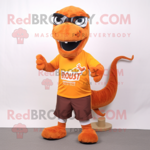 Rust Diplodocus mascot costume character dressed with a Running Shorts and Reading glasses