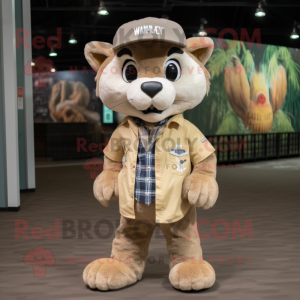 Tan Lynx mascot costume character dressed with a Flannel Shirt and Berets