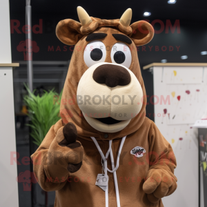 Brown Jersey Cow mascot costume character dressed with a Hoodie and Earrings